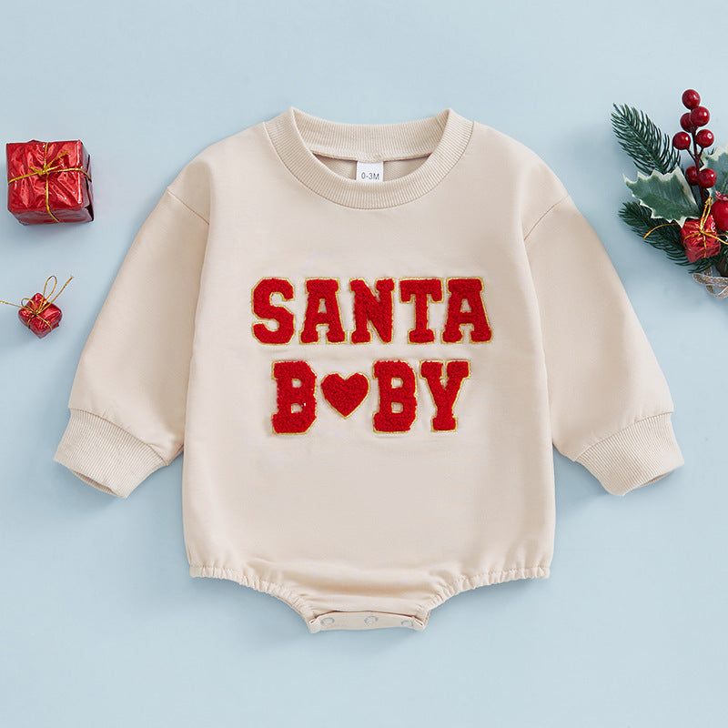 close-up of embroidered santa baby text detail on baby christmas romper