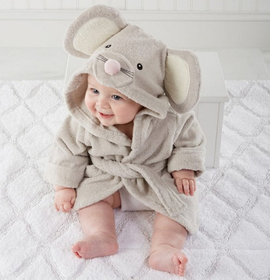 baby wearing hooded animal cotton bathrobe sitting on soft towel
