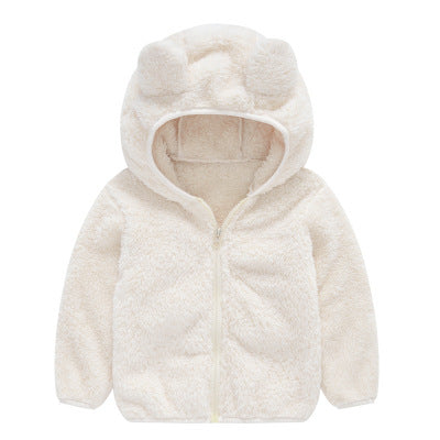 close-up of girls faux fur hooded winter jacket fabric texture showing soft material
