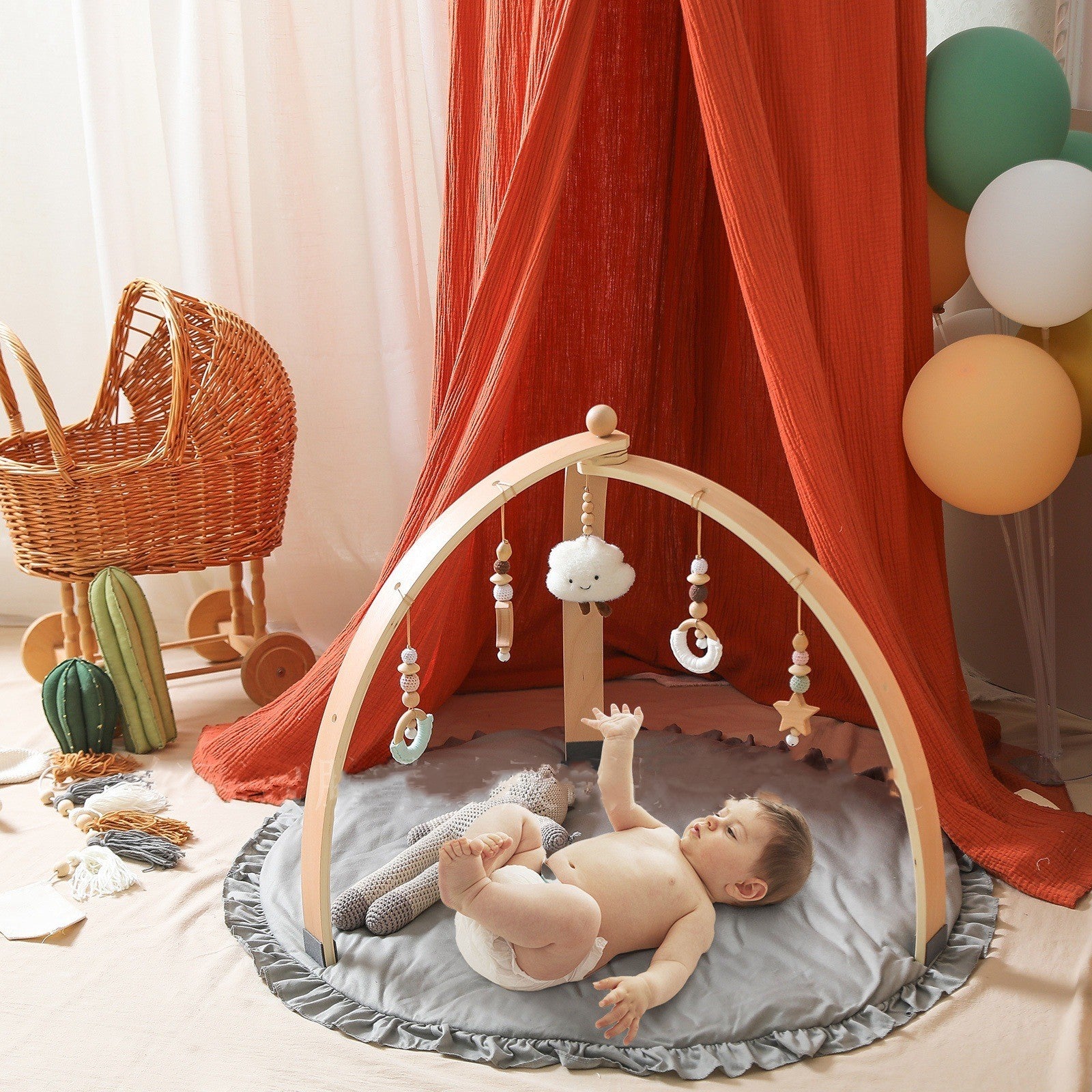 foldable wooden baby gym with gray round playmat